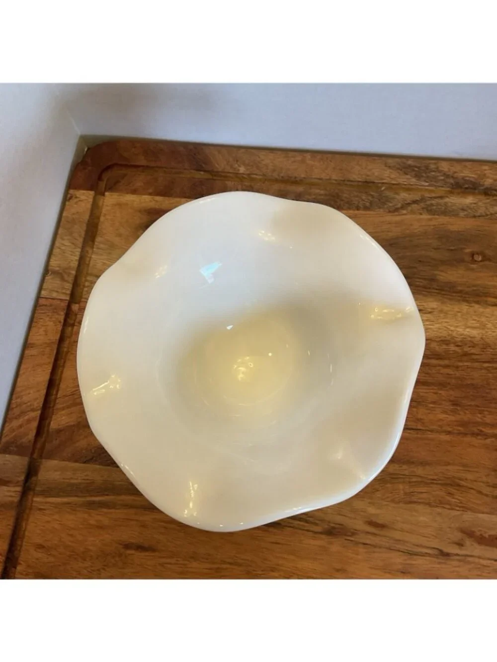White milk Glass Wavy Footed Bowl With Grape Leaf embossed Pattern